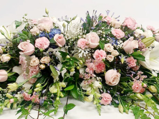 Casket-Spray-Garden-pastel-look-$350.00