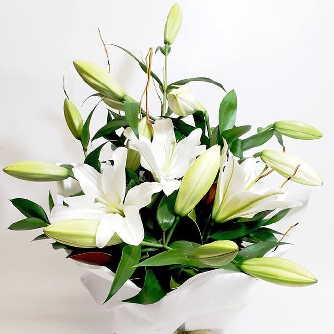 Elegant-lilies-in-a-water-filled-box-75.00